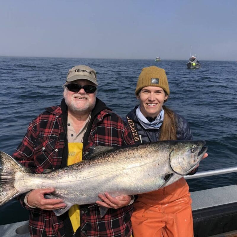 Angling Unlimited guest and crew member Sarah Farber hold king salmon