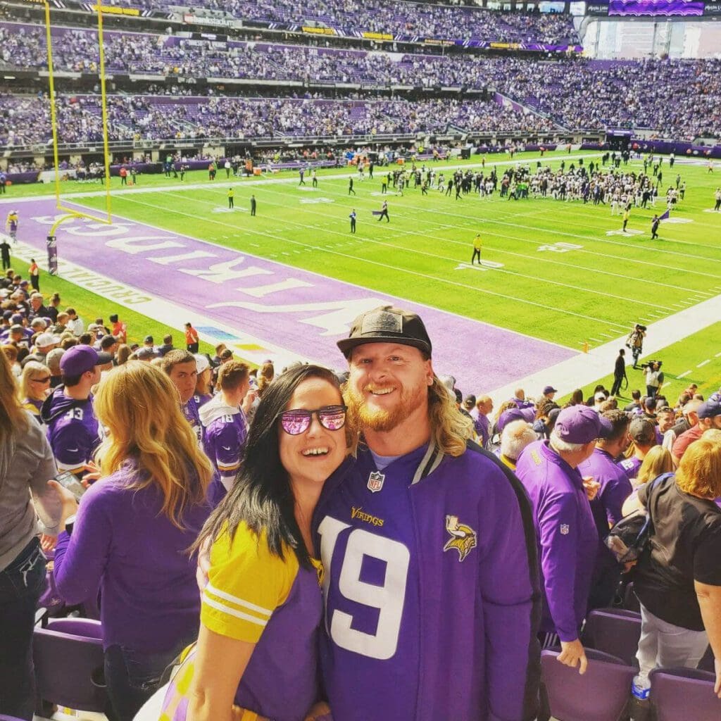 Couple in the crowd at Minnesota Vikings game