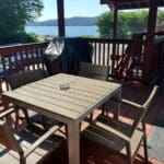 Patio overlooking the water of a lodging accommodation in Sitka, Alaska