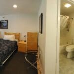 Bedroom and bathroom of a waterview suite in Sitka, Alaska