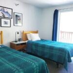 Bedroom of a waterview suite in Sitka, Alaska