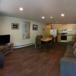 Living room and kitchen of a waterview suite in Sitka, Alaska