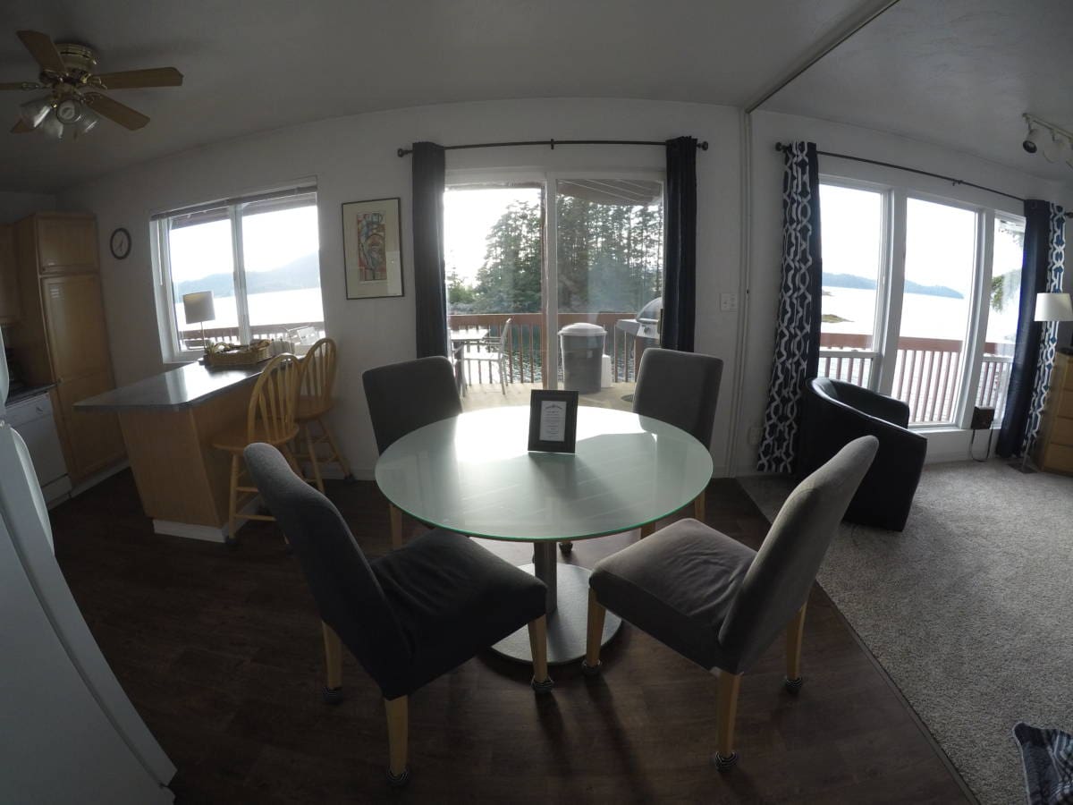 kitchen and dining area of a waterfront suite in Sitka, Alaska