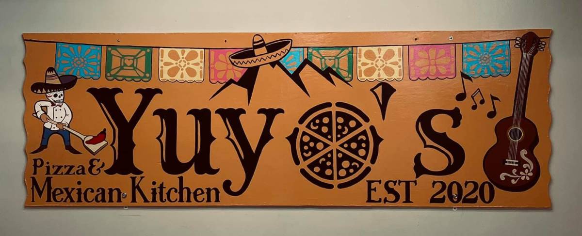 Sign for Yuyo's Pizza and Mexican Kitchen in Sitka, Alaska