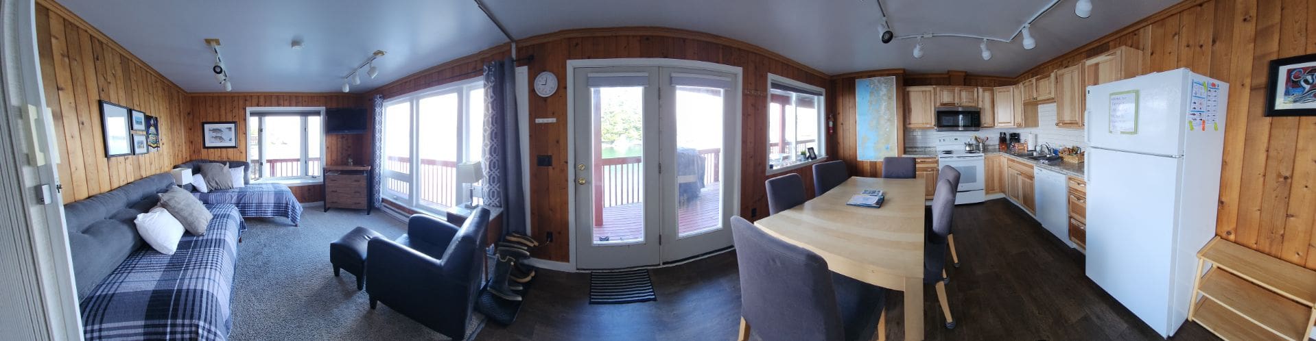 Living room and kitchen of waterfront suite in Sitka, Alaska