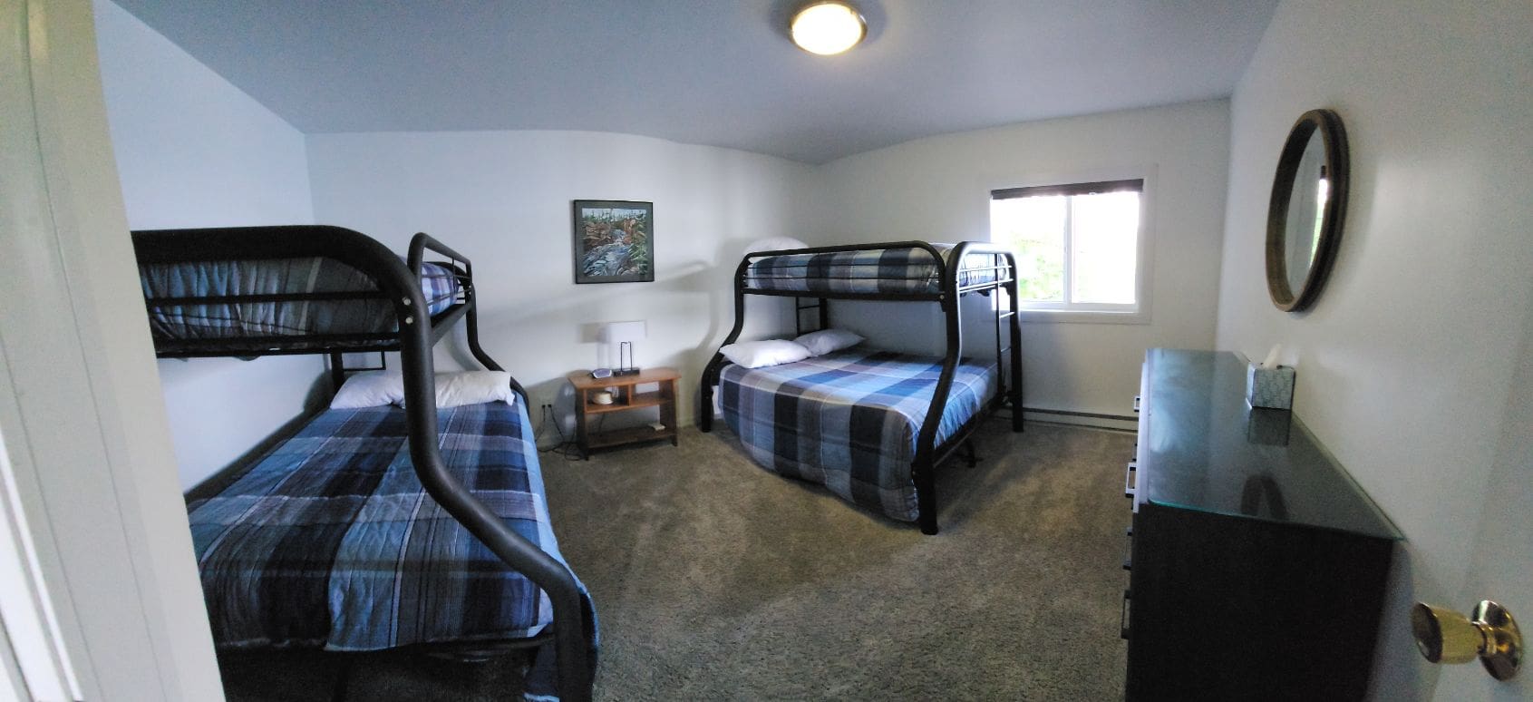 Bedroom of a waterfront suite in Sitka, Alaska